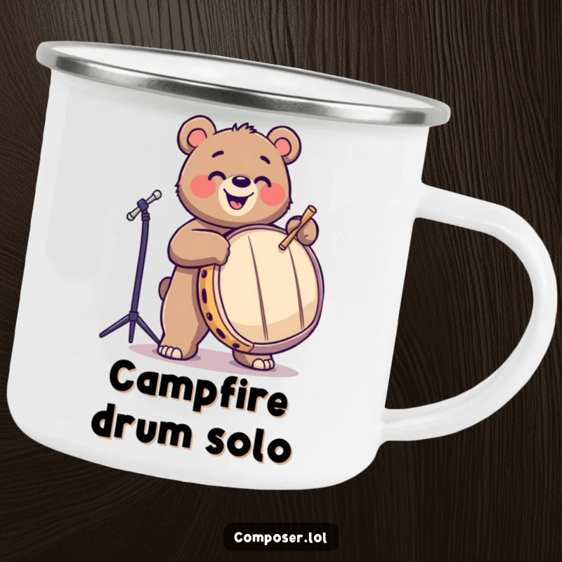 Funny bear joyfully drumming on a large drum on a durable enamel camping mug. Perfect for outdoor enthusiasts.
