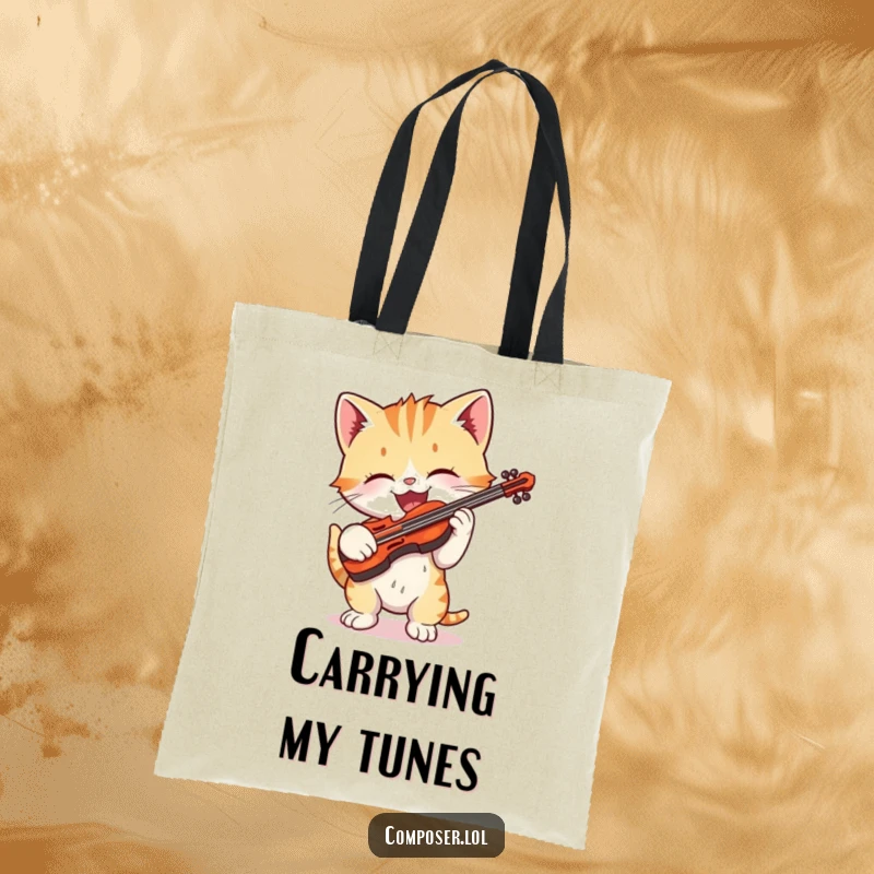 Funny playful kitten gleefully playing a tiny violin on a tote bag, a charming musical accessory.